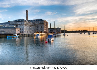 Sunset at the Royal William Yard docks in Plymouth on the Devon coast - Shutterstock ID 324771920