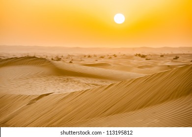 Sunset with sand dunes in desert