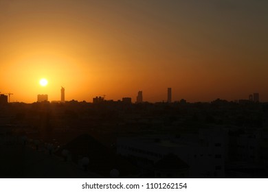 Sunset scene with buildings silhouette in countryside of Jeddah, Saudi arabia