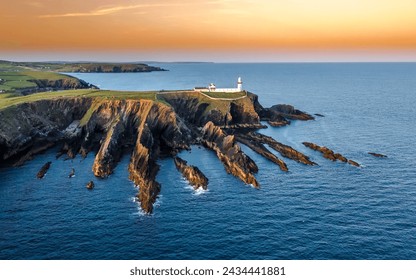 Sunset scene at Galley Head Lighthouse in County Cork Ireland - Powered by Shutterstock