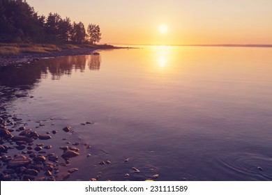 Sunset scene on lake - Powered by Shutterstock
