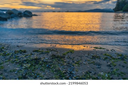 Sunset Scenic Over The Beach. Beautiful Sunset At The Pacific Ocean Canada. Travel Photo, Selective Focus, Blurred, Copy Space For Text