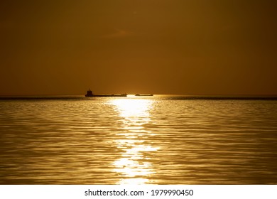 sunset at sea. variety of colors and hues of the rising sun. Sea landscape. - Shutterstock ID 1979990450