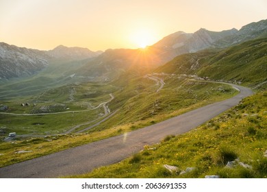 Sunset at Sedlo pass in Durmitor National park, village Zabljak, Montenegro. Scenic mountain road ladscape during beautiful sunset in Montenegro.