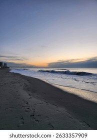 a sunset seen over the ocean
