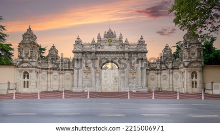 Sunset shot of closed gate leading to former Ottoman Dolmabahce Palace, or Dolmabahce Sarayi, suited in Ciragan Street, Besiktas district, Istanbul, Turkey