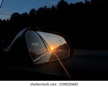 Sunset From A Sideview Mirror