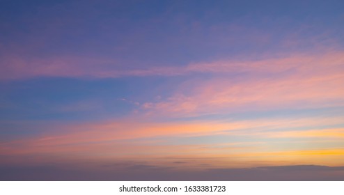 Sunset sky. Abstract nature background. Dramatic blue and orange, colorful clouds at twilight time. - Shutterstock ID 1633381723