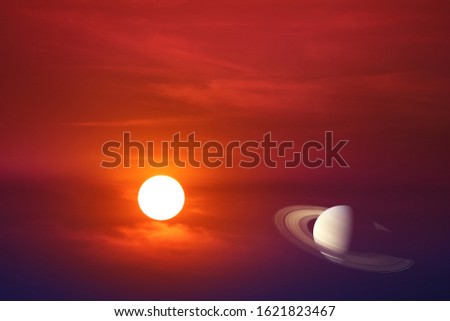 sunset sky back on red cloud and colse up to rings of saturn planet, Elements of this image furnished by NASA