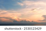 Sunset, Sky Blue and Cloud over Sea in the Evening with Orange,Pink,Yellow,Summer Sea Beach with Golden Sunlight,Horizon Seaside with Dramatic Dusk sky landscape with sunrise in Autumn,Winter Morning