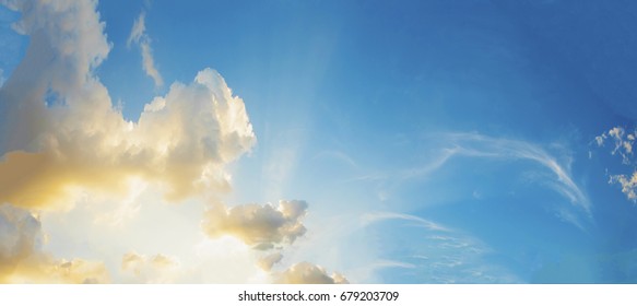 Sunset sky, blue sky with cloud and sun beam. Beautiful natural scene background.