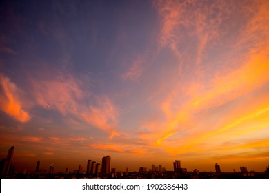Sunset sky with city in the shadow background - Powered by Shutterstock