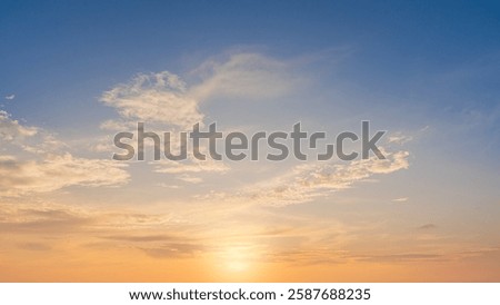 Sunset sky cloud background, Evening dramatic dusk sky cloud with Orange, Yellow, Blue sunlight in Summer season or Horizon morning Sunrise sky and colorful golden hour beautiful nature sweet Sunshine