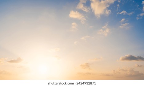 Sunset sky clouds in the evening with Orange, Yellow sunlight in Golden hour, Horizon sky nature background   - Powered by Shutterstock