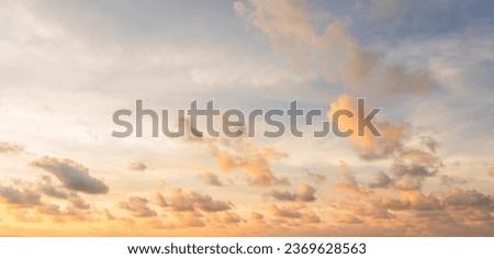 Sunset sky clouds in the evening with orange sunlight, Horizon sky background 