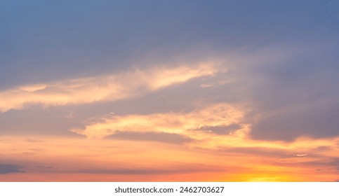Sunset sky clouds in the evening with Red, Orange, Yellow and Purple dark blue after sundown, Romantic sky in Summer on Dusk twilight Backgrounds 