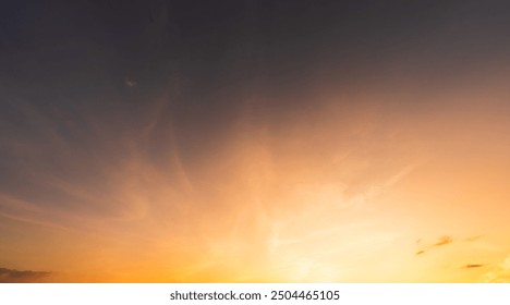 Sunset sky clouds the evening with Red, Orange, Yellow sunlight in Golden hour after sun down, Dramatic clouds in summer on Dusk sky Twilight background 