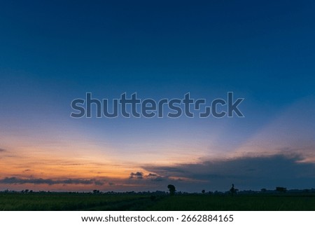 Sunset Sky Clouds in the evening with Red, Orange, Yellow and purple sunlight on Golden hour after sundown.