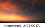 Sunset Sky clouds over Horizon sea landscape in the Evening Summer season Background, Dramatic Colorful Orange, Yellow sunlight fluffy after sundown on Twilight, Dusk sky backgrounds  