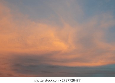 Sunset Sky with Clouds and Power Lines