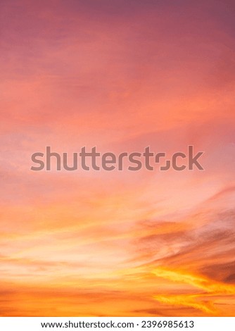 Sunset sky clouds vertical, Colorful sunrise sky with Orange, Pink, Yellow in the evening on Golden Hour Romantic sky background 
