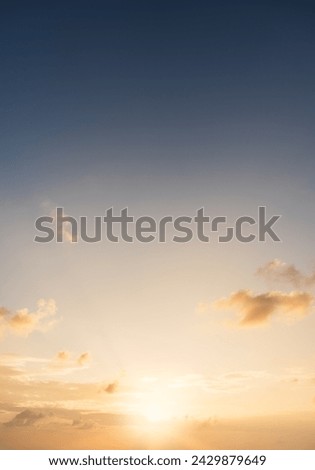 Sunset Sky clouds Vertical in the evening on Golden hour sundown or orange sunrise in the morning, Horizon sun sea sky landscape Background 