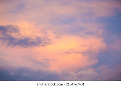 Sunset Sky With Colorful Clouds. Blue Colors Merge With Soft Orange.