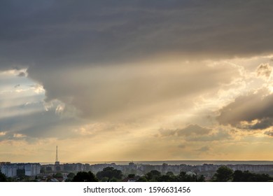 Sunset sky covered with dramatic storm puffy clouds before rain.