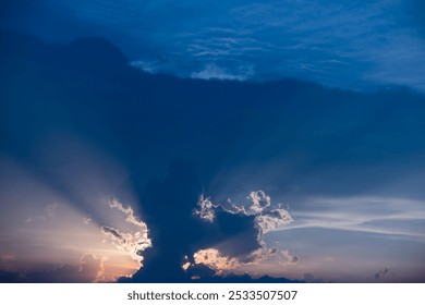 Sunset sky dramatic sunset clouds and sunset sunrays. Beautiful colorful dramatic sky with clouds at sunset or sunrise. Sun rays. Skyscape nature composition. Natural sky background. - Powered by Shutterstock - Get 15% off with code: PIKWIZARD15