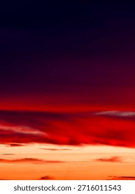 Sunset sky with dramatic streaked clouds and vibrant red-orange-purple hues – ideal nature background for commercial use Abstract Gradient Backdrop 
