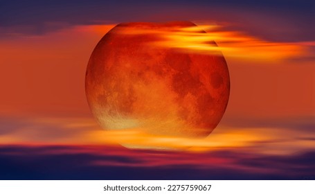 Sunset sky with full moon in the clouds 