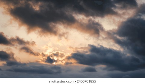 Sunset sky with gray clouds. Evening sky nature background texture