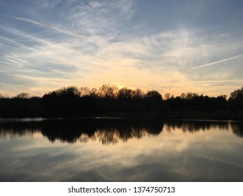 Sunset Sky And Lake Reflection At Claude Moore Park, Sterling, Virginia