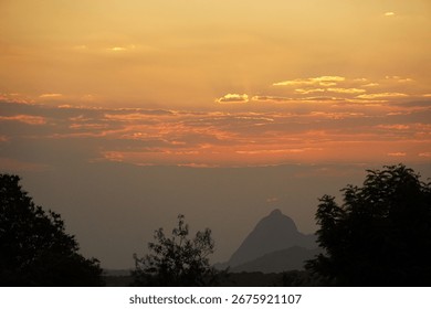 Sunset sky with layered clouds