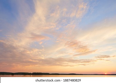 sunset sky with multicolor clouds. Dramatic twilight sky background