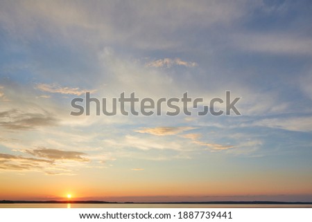 sunset sky with multicolor clouds. Dramatic twilight sky background