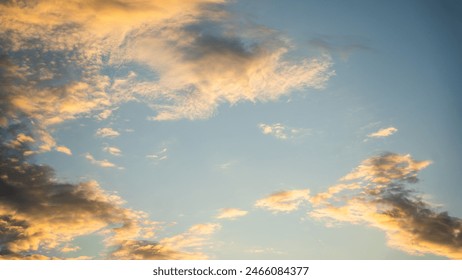 Sunset sky with orange clouds. High quality photo
