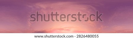 Sunset sky pink clouds panorama featuring a 360 degree view of a colorful twilight atmosphere with soft purple tones
