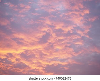 Sunset sky and red clouds background