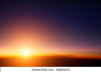 Sunset sky stratosphere background  pictured from plane 