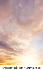 Sunset sky vertical nature background with orange sunrise in the morning