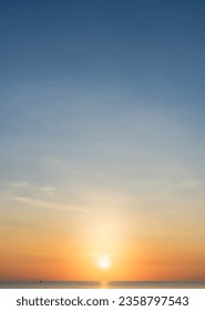 Sunset sky vertical over sea in the morning with orange sunrise, Landscape bright sky horizon sea - Shutterstock ID 2358797543