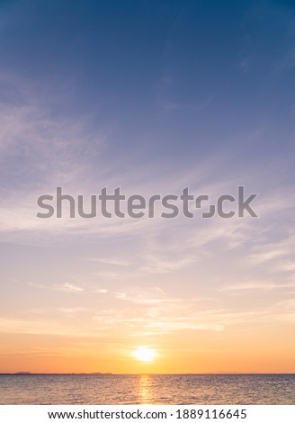 Sunset sky vertical over sea in the evening with colorful sunlight,Dusk sky 