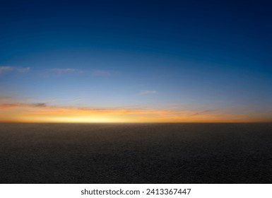 Sunset Sky,Cloud Background,Horizon Evening Summer twilight dusk sky with gloomy vivid blue, yellow, orange with sunlight reflecting on dark concrete floor texture or rough asphalt street pavement - Powered by Shutterstock