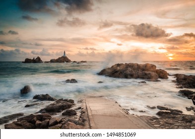 Sunset slow shutter speed at Corbiere Lighthouse in Jersey Channel Islands