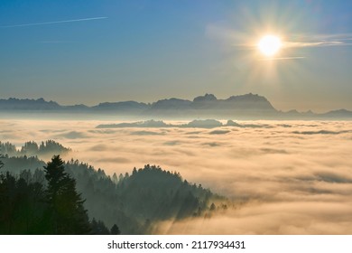   sunset in the snowy Bregenzer Wald area of Vorarlberg, Austria with spectacular view on Mount Saentis above a sea of fog, Switzerland, Sulzberg, Austria, landscape
                              - Shutterstock ID 2117934431