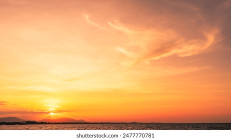 Sunset Summer Sky Clouds over sea in the evening with Red, Orange, Yellow Gold sunlight in Golden hour and Dramatic fluffy, Horizon sea Sky landscape, Dusk sky Background  - Powered by Shutterstock