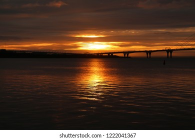 sunset sun and bridge