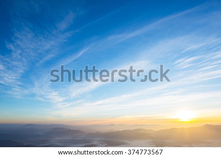 Sunset with sun rays,  sky with clouds and sun.