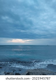 Sunset or sunrise with stormy clouds over the Black sea near the town of Pomorie in Bulgaria. Beautiful seascape from the shore.